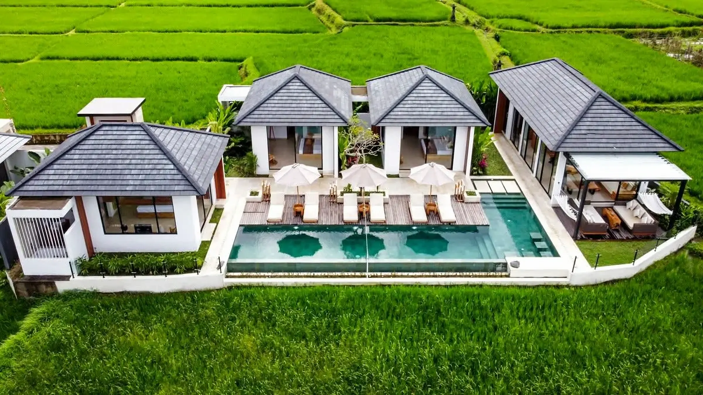 The villa and the pool from straight on