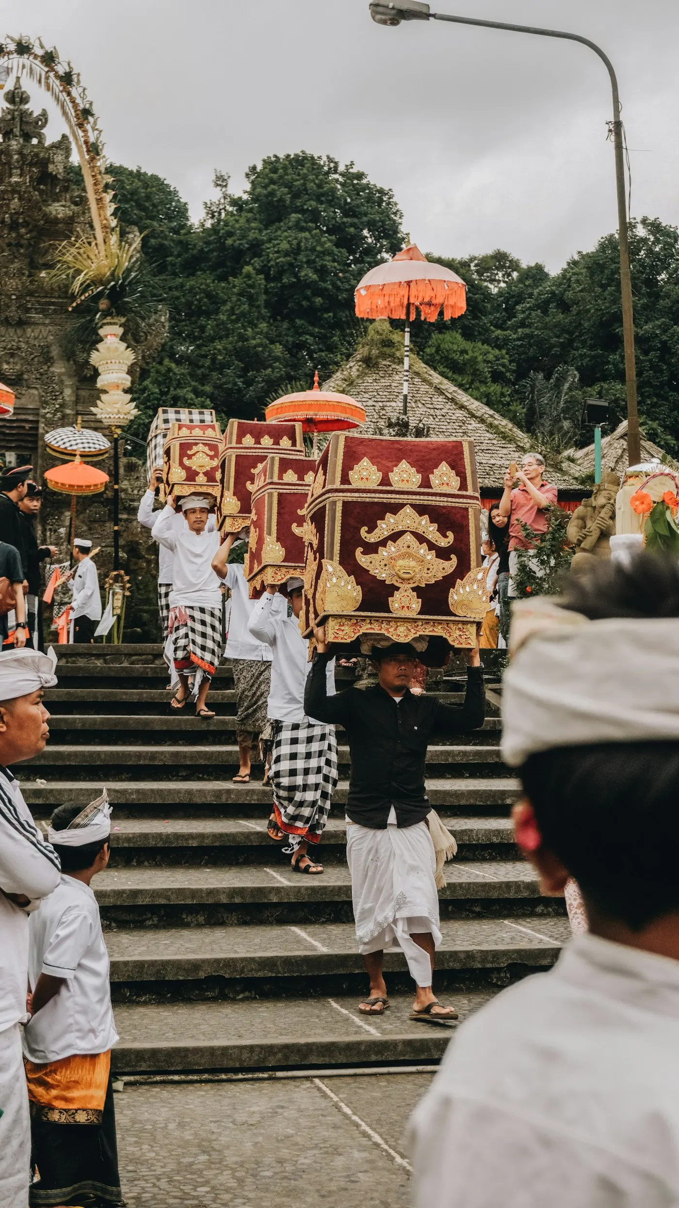 A Balinese procession passing through the village